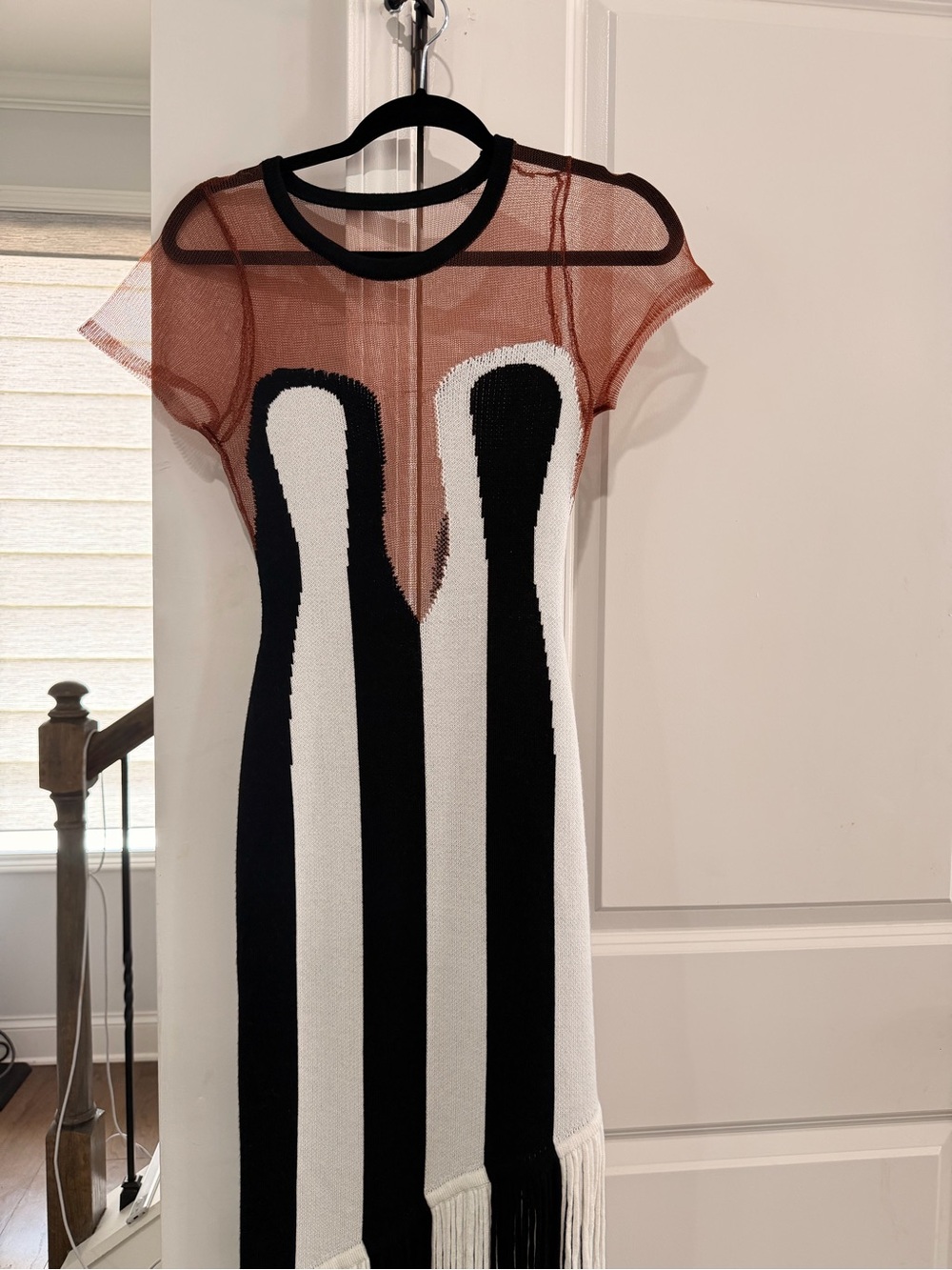 This is a Hanifa Zariah Tassel Knit Dress,striking black and white